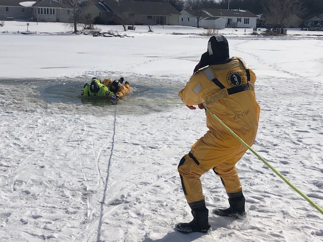 Firefighters conducting ice rescue training